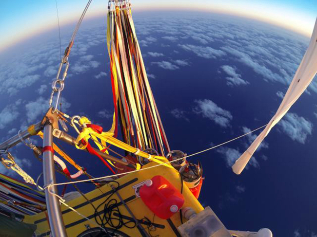 The helium-filled balloon carrying Troy Bradley and Leonid Tiukhtyaev crosses the Pacific Ocean after taking off from Saga, Japan.   AP-Yonhap