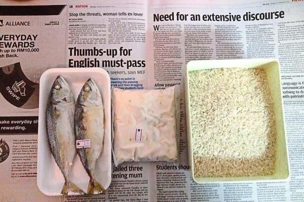A photo submitted by Atty Sulaiman showing what a person can buy with RM7 a day ― (from left) fish, tempe and rice.    The Star