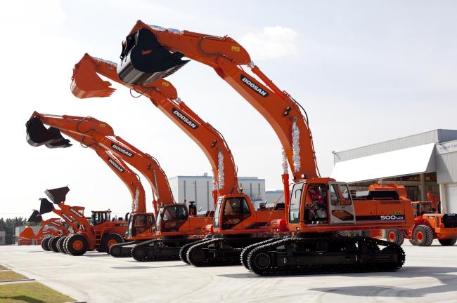 Doosan Infracore construction vehicles.   Doosan Infracore