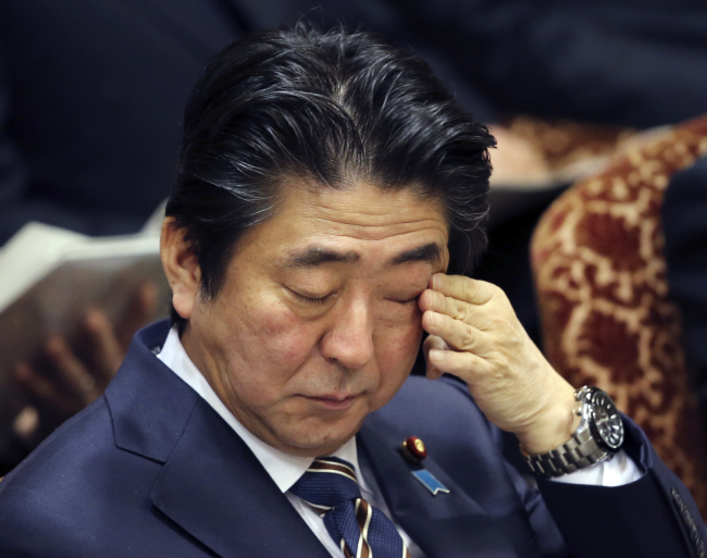 Japanese Prime Minister Shinzo Abe attends an Upper House Budget Committee meeting of Parliament in Tokyo, Monday, Feb. 2. (AP)