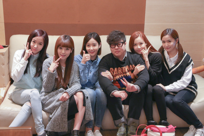 K-pop producer Shinsadong Tiger (third from right) poses with the girl group Crayon Pop. Chrome Entertainment
K-pop producer Shinsadong Tiger (third from right) poses with the girl group Crayon Pop. Chrome Entertainment
