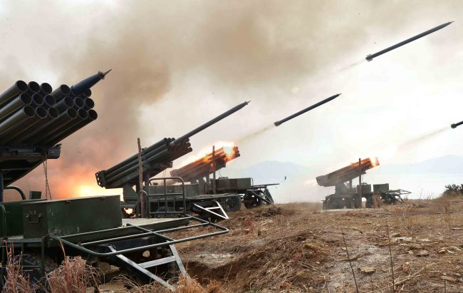 Rockets are fired during a North Korean live-ammunition exercise. The Rodong Sinmun reported Saturday that the troops under the 4th Corps of the North’s Korean People’s Army had carried out the drills.   Yonhap