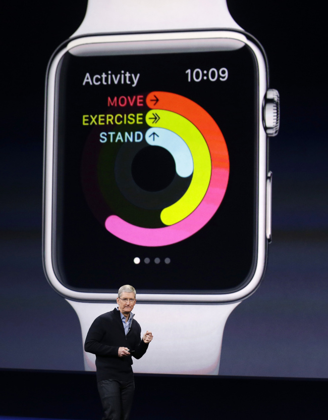 Apple CEO Tim Cook explains the features of the new Apple Watch during an Apple event in San Francisco on Monday. AP-Yonhap