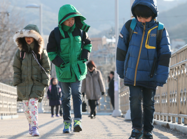 About 50 percent of Korean children say they are under pressure to do well academically. Yonhap
