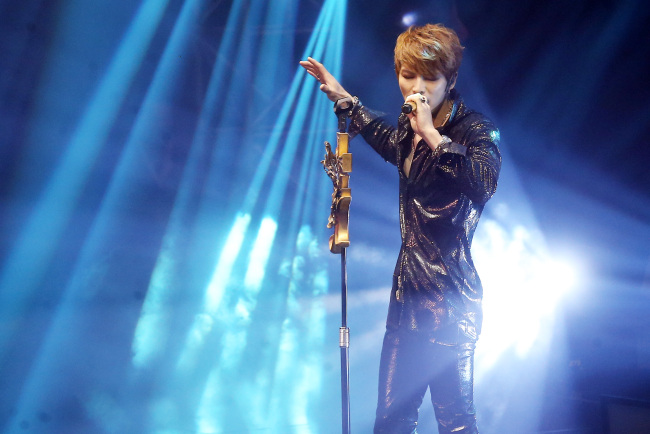Singer Kim Jae-joong performs during his concert at the Hwajung Gymnasium of Korea University in Seoul on Saturday.   Yonhap