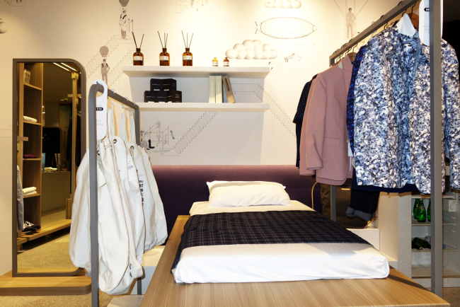 Formal contemporary menswear brand MVIO’s shop interior has been designed to resemble a boutique hotel.   Rumy Doo-The Korea Herald