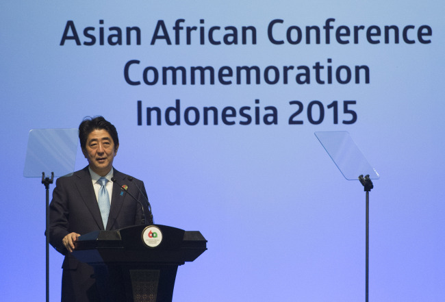 Shinzo Abe speaks during the Asia-Africa Summit in Jakarta on Wednesday.    Xinhua-Yonhap