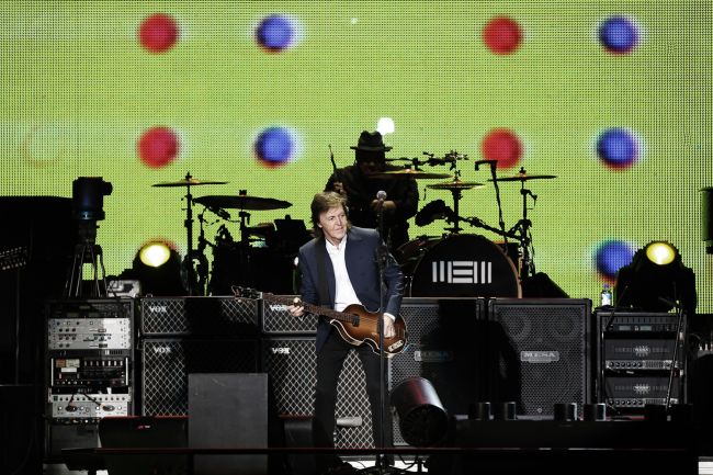 Legendary Beatles member Paul McCartney performs in front of nearly 45,000 fans at his first concert in Korea on Saturday at the Jamsil Sports Complex in Seoul.  Yonhap