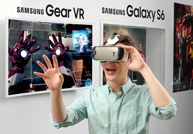 South Korean tech giant Samsung Electronics said Wednesday that the new Samsung Gear VR, a virtual reality headset for the Galaxy S6 and S6 Edge, would hit the shelves in Seoul on Thursday. The new virtual reality device, which boasts a slimmer design than the preceding model and comes with more than 30 different game titles, is priced at 249,000 won ($230).  Samsung Electronics