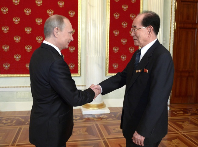 Russian President Vladimir Putin (left) and North Korean Chairman of the Presidium of the Supreme People’s Assembly Kim Yong-nam shake hands at their meeting in the Kremlin in Moscow, Russia, Saturday.   AP-Yonahp
Russian President Vladimir Putin (left) and North Korean Chairman of the Presidium of the Supreme People’s Assembly Kim Yong-nam shake hands at their meeting in the Kremlin in Moscow, Russia, Saturday.   AP-Yonahp