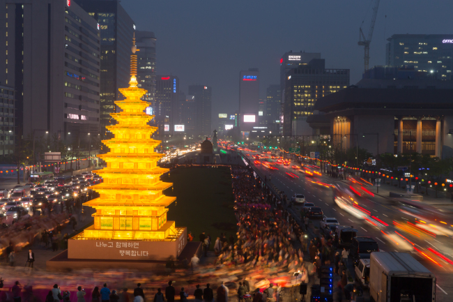 An oversized lantern resembling the stone pagoda of Mireuksa Temple is lit in Gwanghwamun Square in central Seoul.