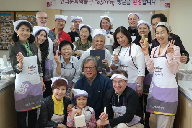 CICI members pose at a traditional Korean cookie-making event in Pocheon City, northeast of Seoul, on May 9.   CICI