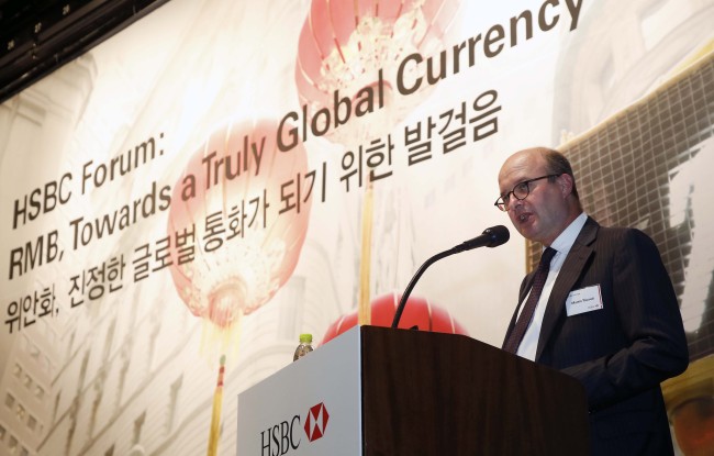 Martin Tricaud, president and CEO of HSBC’s Korean operation, speaks at its second forum for Korean clients on China and the renminbi in Seoul on Tuesday.   HSBC