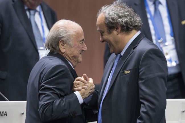 FIFA president Sepp Blatter after his election as President greeted by UEFA President Michel Platini (right), at the Hallenstadion in Zurich, Switzerland, Friday.   AP-Yonhap