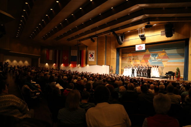 Gracias Choir performing at the Modeon Theater in Marktoberdorf, Germany, at the 14th International Chamber Competition Marktoberdorf. Gracias Choir
Gracias Choir performing at the Modeon Theater in Marktoberdorf, Germany, at the 14th International Chamber Competition Marktoberdorf. Gracias Choir