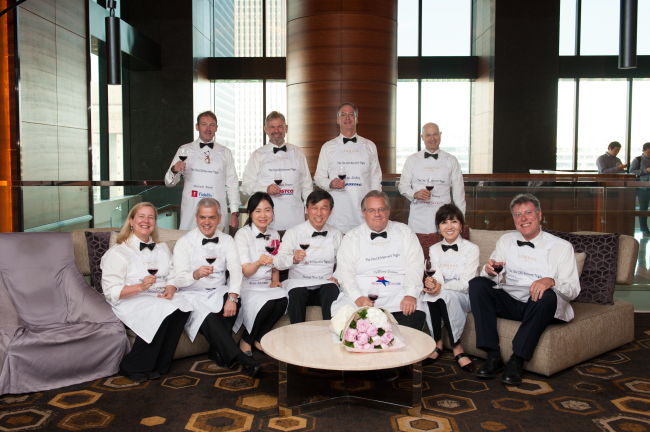 Foreign executives participating in this year’s CEO Servers’ Night, hosted by AMCHAM, pose at the Conrad Hotel in Seoul on Wednesday.   AMCHAM