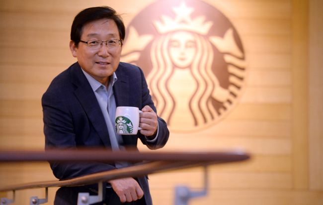 Starbucks Coffee Korea CEO Lee Seock-koo poses at his company in Seoul. (Ahn Hoon/The Korea Herald)