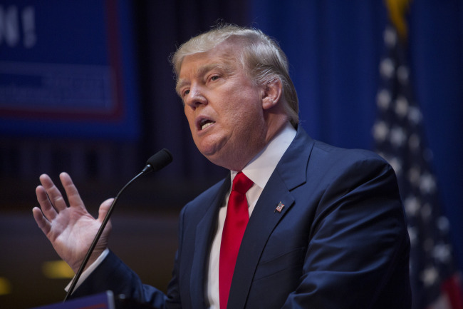 Donald Trump, president and chief executive of Trump Organization Inc., speaks while announcing he will seek the 2016 Republican presidential nomination at Trump Tower in New York, U.S., on Tuesday, June 16, 2015. Billionaire television personality and business executive Donald Trump formally began his Republican presidential campaign today in Manhattan, saying that the United States has become "a dumping ground for other people's problems." Photographer: Victor J. Blue/Bloomberg *** Local Caption *** Donald Trump
Donald Trump, president and chief executive of Trump Organization Inc., announces he will seek the 2016 Republican presidential nomination at Trump Tower in New York on Tuesday.    Bloomberg