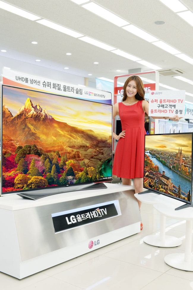 LG Electronics holds a cashback event for its organic light-emitting diode and ultrahigh-definition TVs through this month, in which consumers can receive up to 2 million won ($1,800) cash back.   LGE