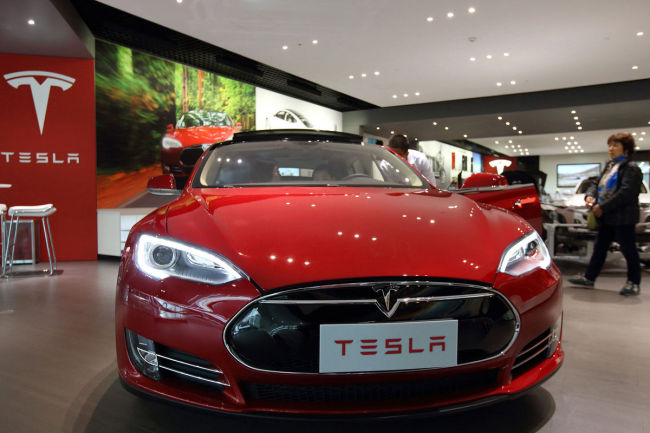 A Tesla Model S sedan sits at a dealership in Beijing.   Bloomberg