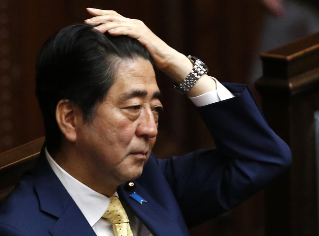 In this July 16 phpoto, Japanese Prime Minister Shinzo Abe attends a plenary session at the lower house in Tokyo. (AP-Yonhap)