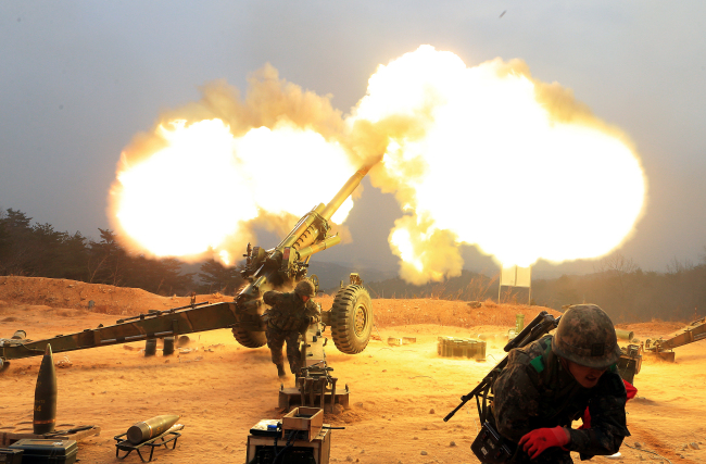 South Korea on Thursday fires dozens of shells toward North Korea in response to the North's artillery attack. (Yonhap)