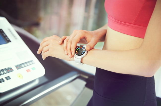 A model rotates the bezel ring of the Galaxy Gear 2.    Samsung Electronics