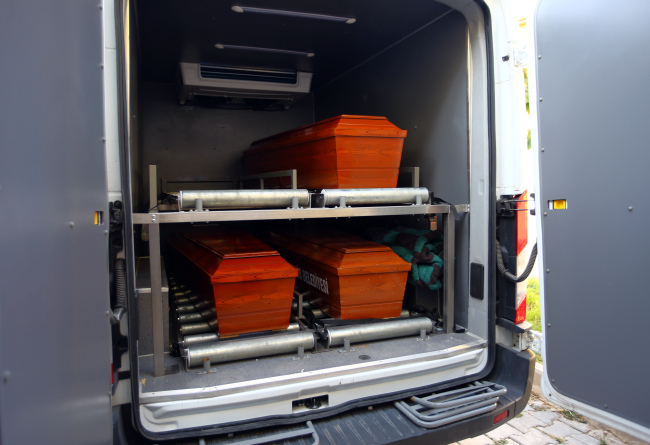 The coffins of mother Rehan Kurdi, and Syrian boys Aylan, 3, and Galip, 5, who were washed up drowned on a beach near Turkish resort of Bodrum on Wednesday, are placed in a funeral car in Mugla, Turkey, Thursday. (AP-Yonhap)