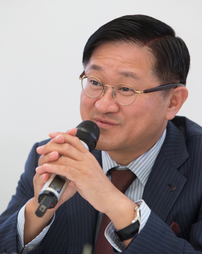 AmorePacific chairman Suh Kyung-bae talks to the media on Wednesday at the company’s museum in Osan, Gyeonggi Province. 　AmorePacific