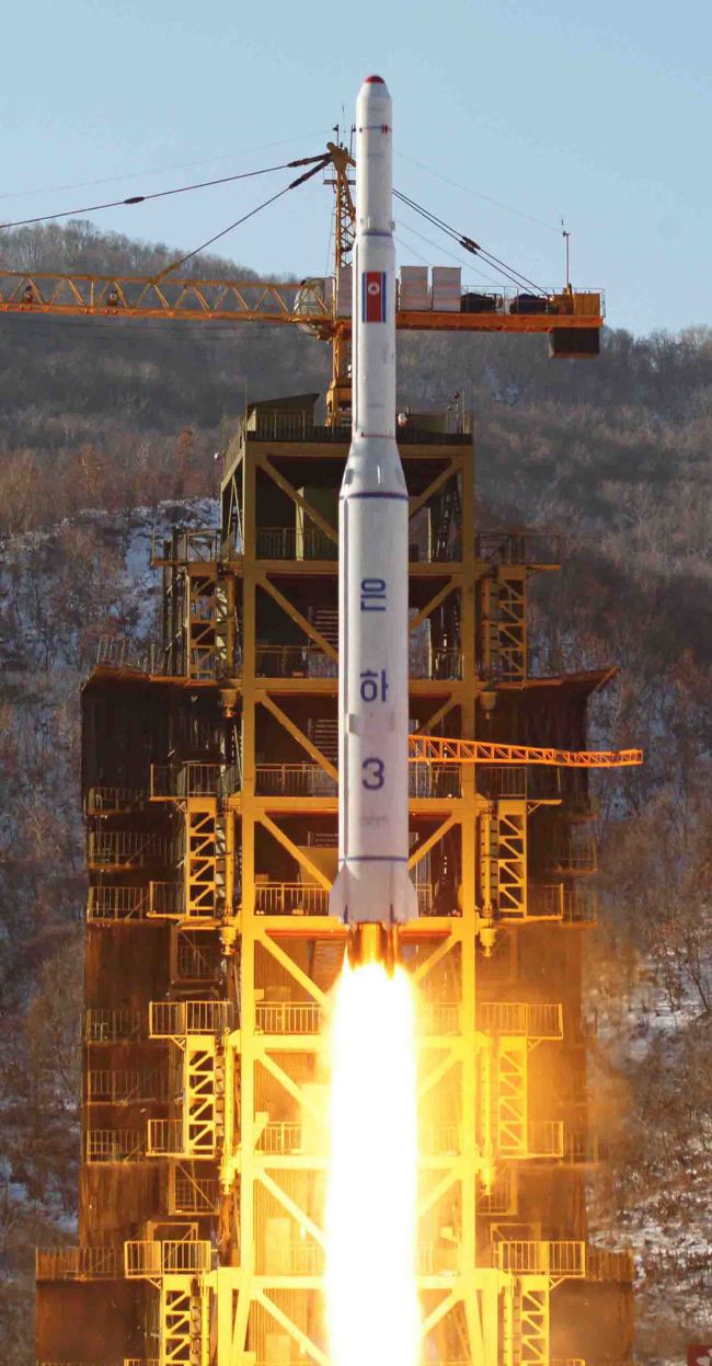 The file photo shows North Korea's launch of a long-range rocket in 2012. (Yonhap)