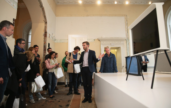SAMSUNG PARTNERS WITH DESIGNERS FOR TV -- Tech firm Samsung Electronics introduces the Samsung Serif TV, designed in collaboration with furniture designers Ronan and Erwan Bouroullec, at the London Design Festival on Monday. (Samsung)