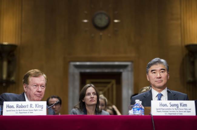 U.S. State Department Special Envoy for North Korean human rights issues, Robert King (left) and State Department Special Representative for North Korea policy, Sung Kim testify during a full committee hearing on "The Persistent North Korea Denuclearization and Human Rights Challenge" on Capitol Hill in Washington, D.C. (AFP)