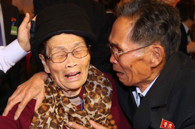 Kim Wol-soon, 93, from South Korea is reunited with her 72-year-old son Ju Jae-eun from the North during the second round of family reunions at Mount Geumgangsan, North Korea, on Saturday. (Yonhap)
