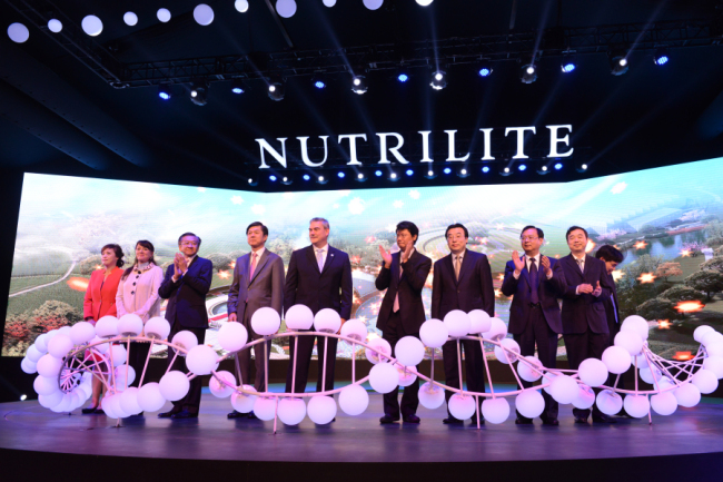 Officials celebrate the opening of the Amway Botanical Research Center in Wuxi, China, last Friday. (Amway)