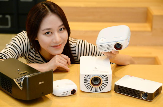 LG LED PROJECTOR IN SPOTLIGHT -- LG Electronics said Tuesday its portable projector lineup Mini Beam has crossed the 500,000 sales mark worldwide, maintaining the No.1 position in the global light-emitting diode projector market for five years in a row. (LGE)