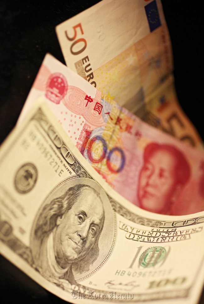 U.S. dollar, Chinese yuan and euro banknotes (EPA-Yonhap)