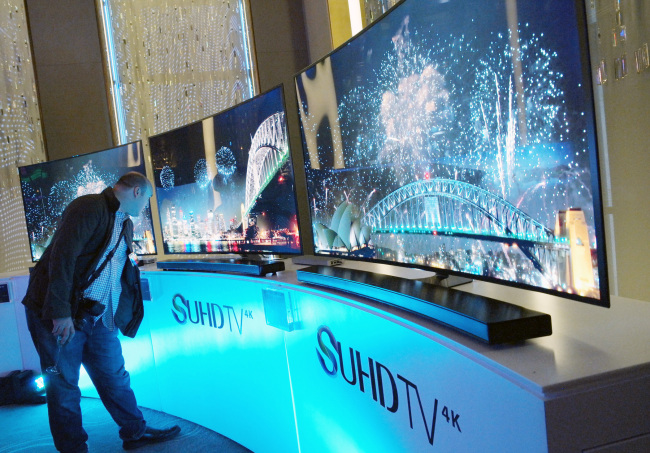 SAMSUNG UHD TV SWEEPS AWARD -- Samsung Electronics’ ultrahigh-definition TV lineup, the JS9500, has received the Best of What’s New award, the tech giant said Thursday. U.S. science magazine Popular Science picks the greatest innovations every year in different industrial categories including aerospace, auto and entertainment for the accolade. (Samsung Electronics)