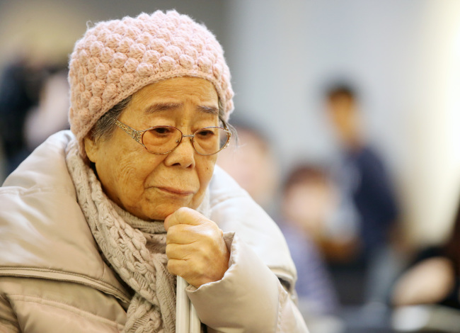 Yoo Hee-nam, one of surviving Korean victims of Japan's WWII sex slavery, attends a press conference on Dec. 9. Yonhap