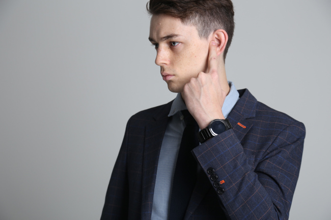 A model hears sound through the finger using a Tip Talk sensor.   Samsung Electronics