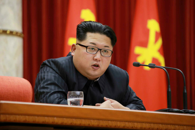 North Korean leader Kim Jong-un speaks during a ceremony awarding scientists for carrying out a “successful” hydrogen bomb test in a photo released by Rodong Shinmun on Wednesday. Yonhap