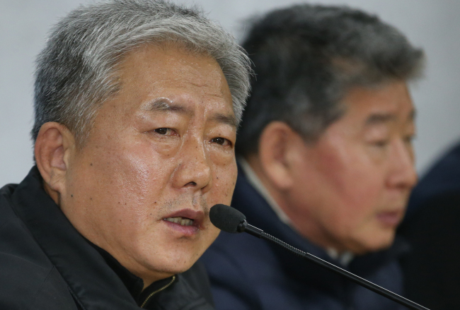 FKTU chairman Kim Dong-man speaks at a news conference on Tuesday. Yonhap