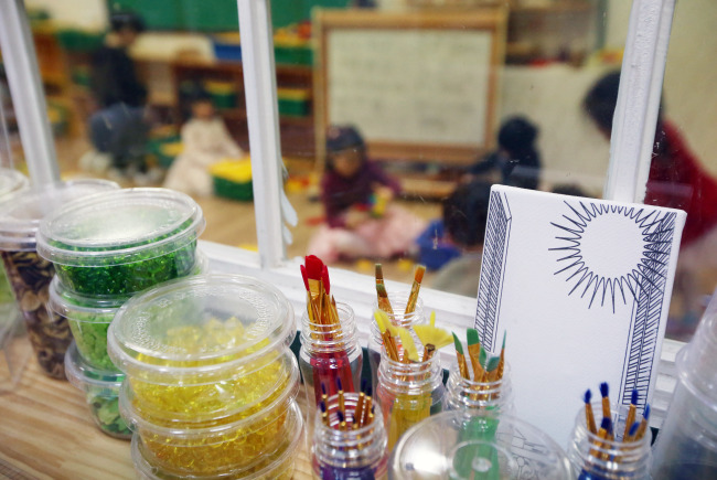 Children attend a kindergarten in Seoul City.  Yonhap
