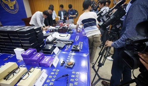 Various types of illegal hidden cameras confiscated by police in Seoul last year Yonhap