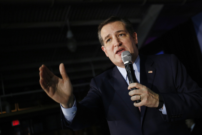 Senator Ted Cruz, a Republican from Texas and 2016 presidential candidate, delivers remarks during his campaign's caucus night celebration at the Elwell Center on the Iowa State Fairgrounds in Des Moines, Iowa, U.S., on Monday, Feb. 1, 2016. Cruz won the Iowa Republican caucuses in an upset over billionaire Donald Trump, while Democrat Hillary Clinton was clinging to the narrowest edge over Senator Bernie Sanders of Vermont. Photographer: Luke Sharrett/Bloomberg *** Local Caption *** Ted Cruz