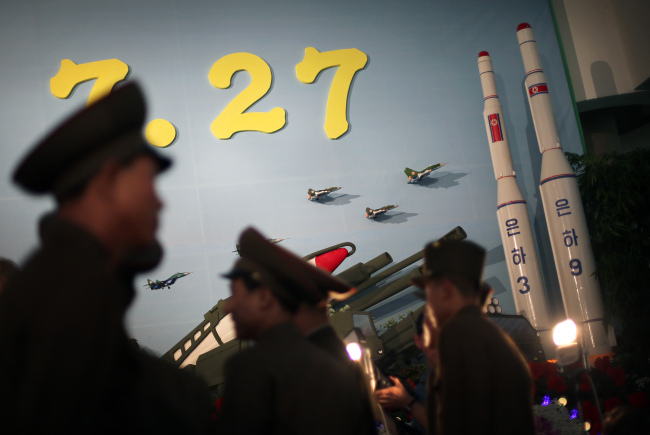 Models of North Korea’s Unha-9 and Unha-3 rockets are displayed at an exhibition hall in Pyongyang in this photo dated July 26, 2013.  Yonhap