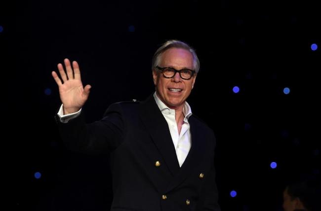 US designer Tommy Hilfiger greets the audience after presenting his creations during the Fall 2016 New York Fashion Week on Feb. 15. (AFP)