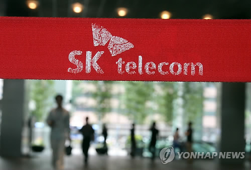 A screenshot image of a report on SK Telecom’s merger, which was released by proxy advisory firm Institutional Shareholder Service this month.
　Yonhap
　
　The logo of network operator SK Telecom at the firm’s head office in Seoul.
　Yonhap