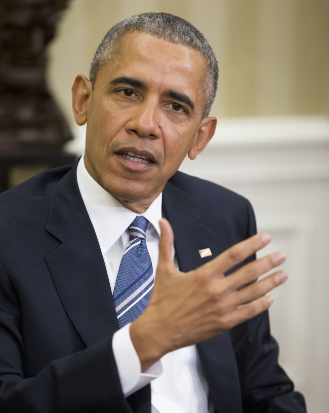 President Barack Obama answers questions from members of the media during his meeting with Jordan's King Abdullah II in the Oval Office of the White House in Washington,Wednesday, Feb. 24, 2016. Obama urged the Republican-run Senate to fulfill its "constitutional responsibility" and consider his Supreme Court nominee, pushing back on GOP leaders who insist there will be no hearing or vote when he names a successor to the late Justice Antonin Scalia. (AP-Yonhap)
