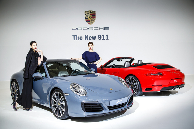 Porsche unveils the new 911 Carrera and 911 Carrera S in a launch ceremony at Dongdaemun Design Plaza in Seoul on Thursday. (Porsche Korea)