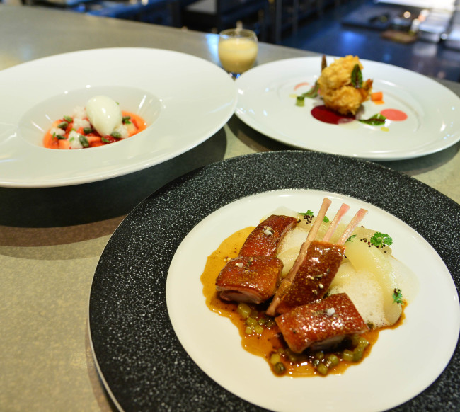 Exquis’ honeyed suckling pig with pear (front), shrimp croustillant with sweet and sour vegetables (back, right) and strawberries with fromage blanc ice cream and tapioca (back, left) (Photo credit: Yoon Byung-chan/The Korea Herald)